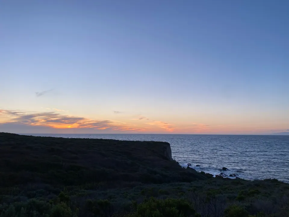 Last light over the bluffs and the ocean