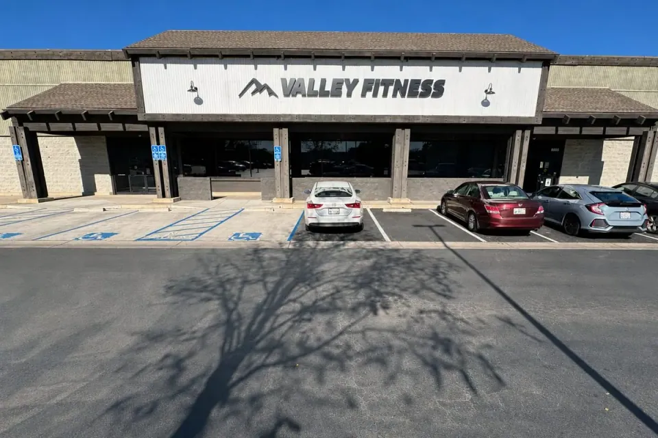 Valley Fitness storefront and parking lot